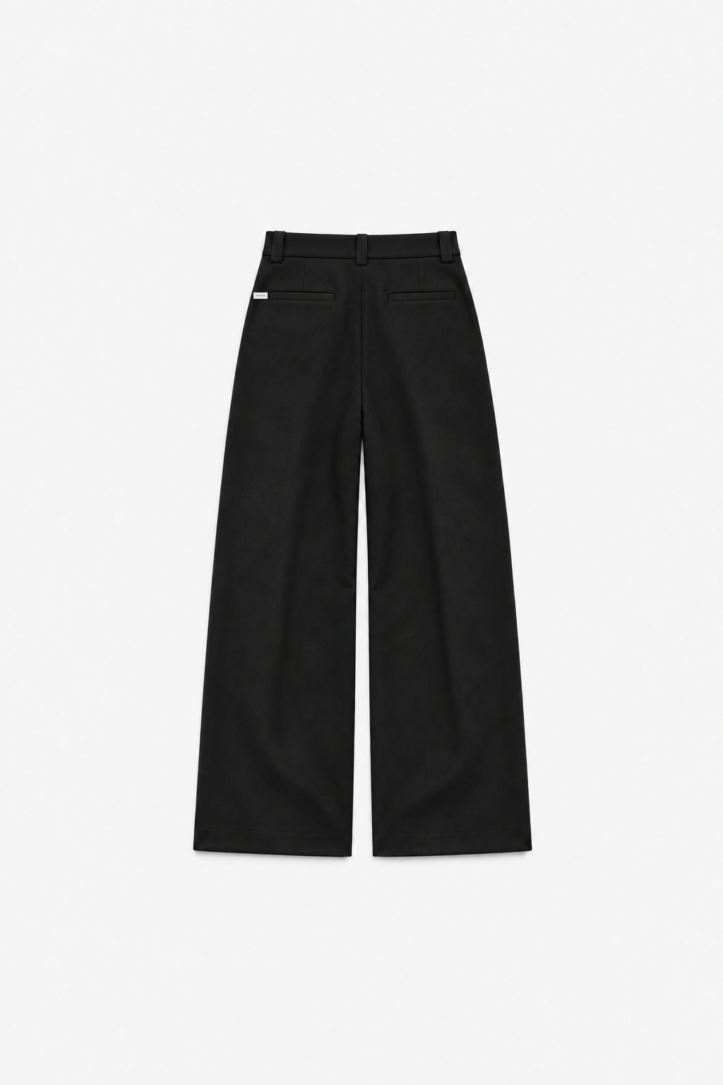 Black Octagon double-layer pleated trousers, back flat lay with small woven label left of the left pocket
