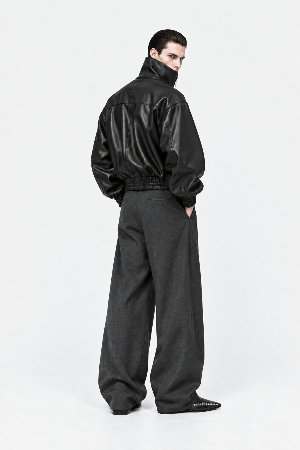 Black high-collar leather jacket, rear fit