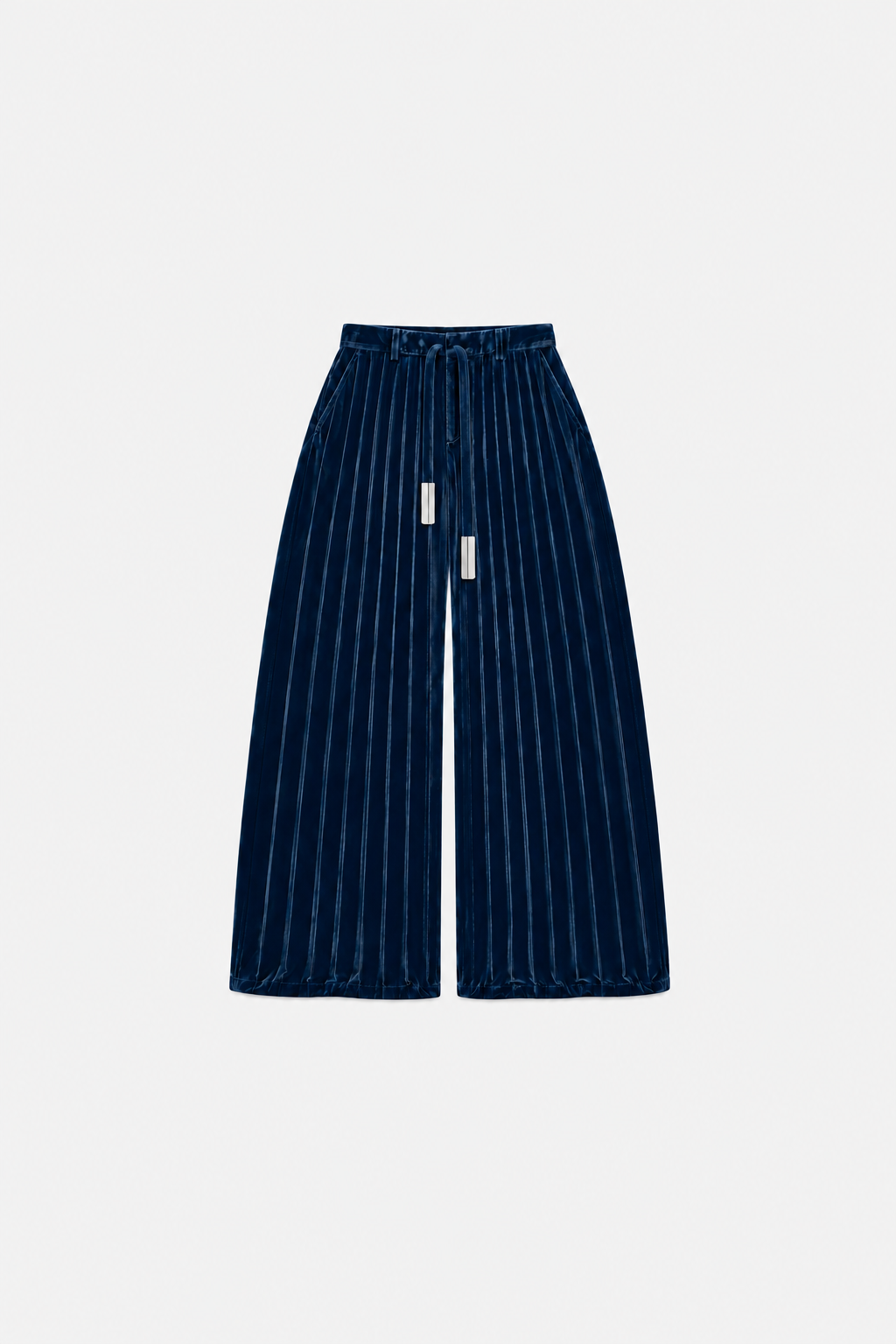 OCTAGON Folio midnight-blue pleated velvet trousers with twin chrome bar ties, front flat lay
