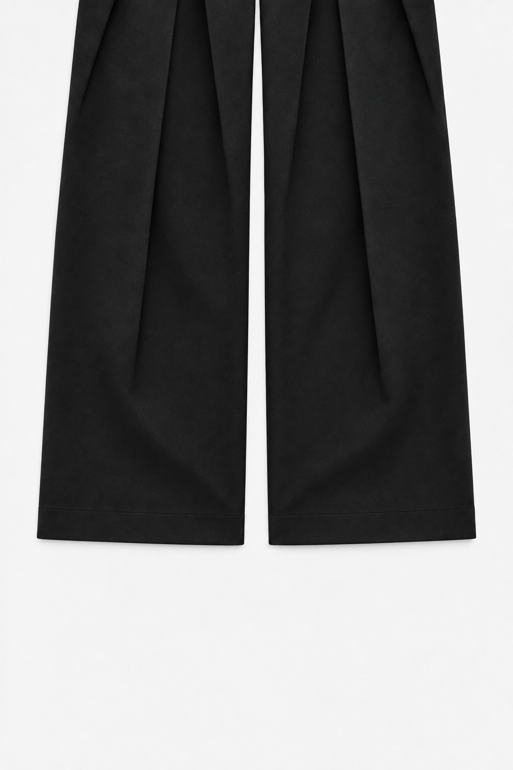 Close view of the wide straight legs and level hems