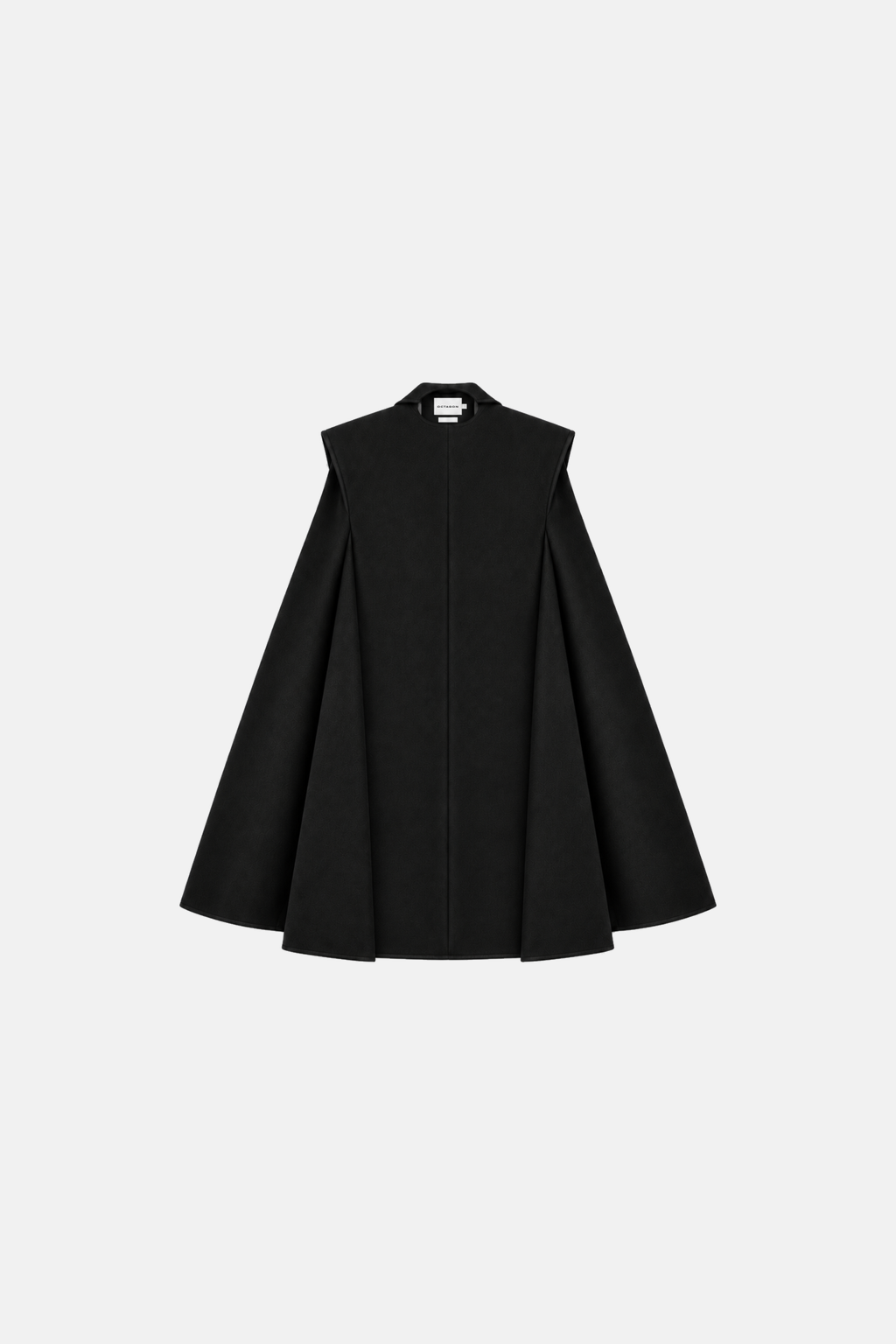 Black OCTAGON Monument cape coat, centered back flat lay