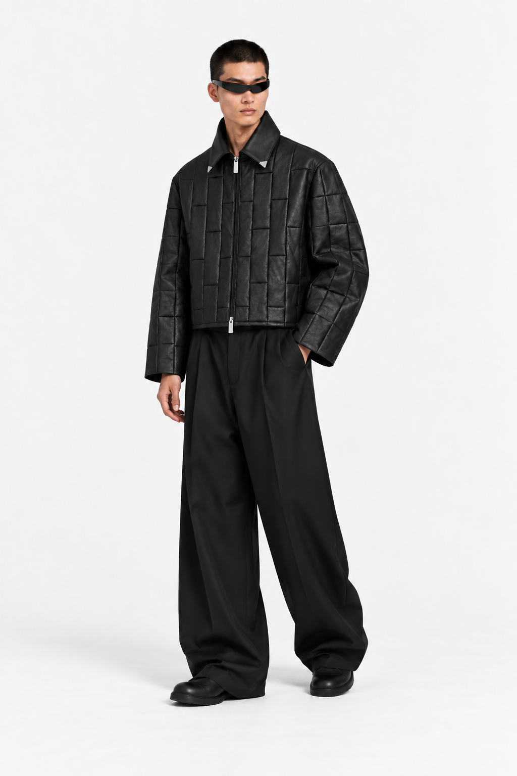 Black leather OCTAGON Pentagon Jacket worn in a three-quarter view