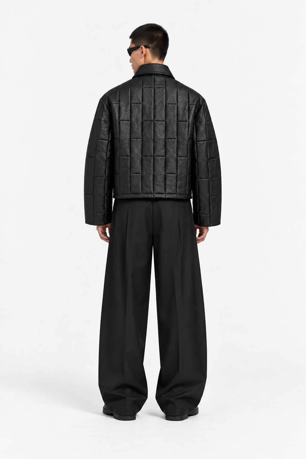 Black leather OCTAGON Pentagon Jacket worn from the back