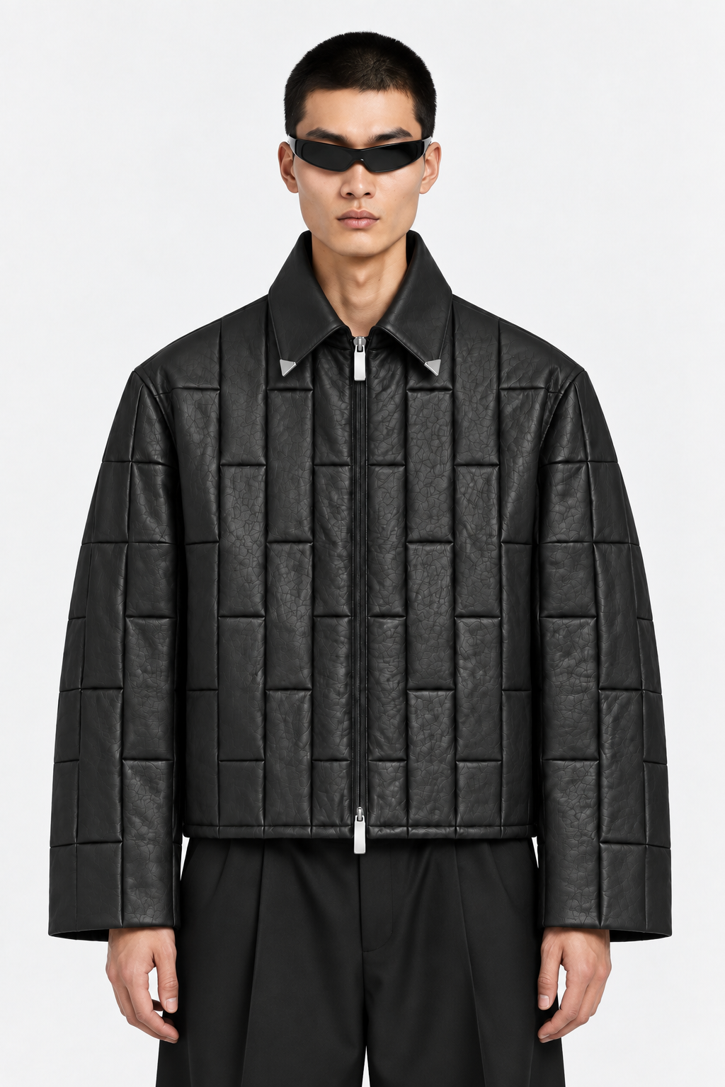 Worn detail of the black leather OCTAGON Pentagon Jacket collar, zipper, and panel construction