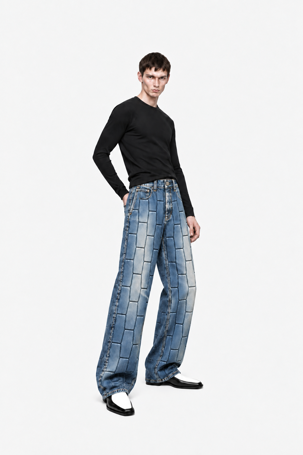 Male model wearing vintage-blue OCTAGON Pentagon debossed jeans, three-quarter view