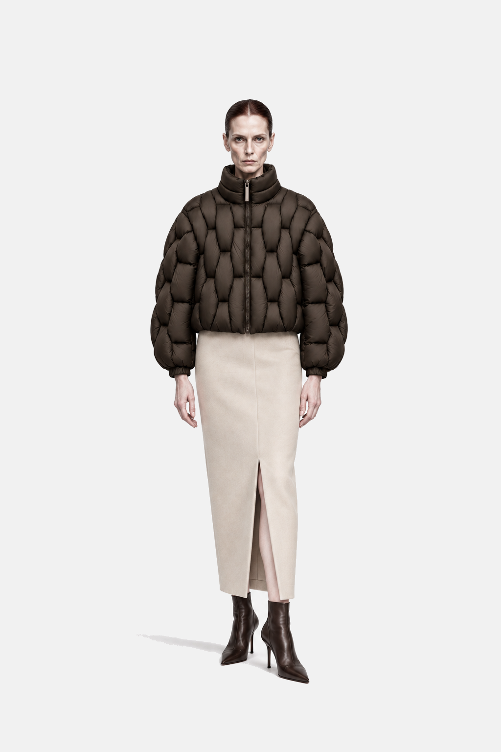 Mature woman wearing the espresso brown OCTAGON Pentagon matte puffer, front view
