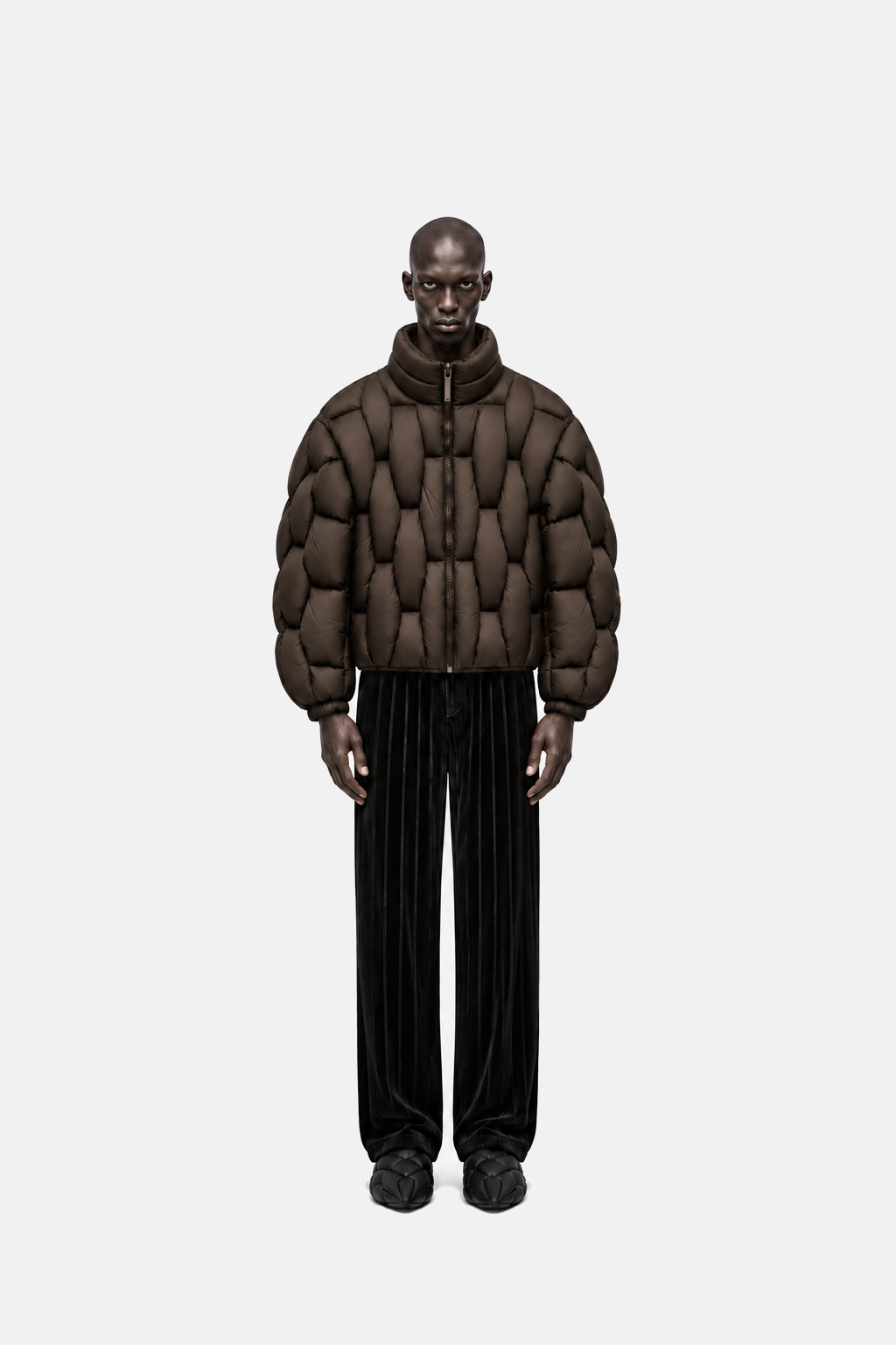 Male model wearing the espresso brown OCTAGON Pentagon matte puffer, straight front fit view