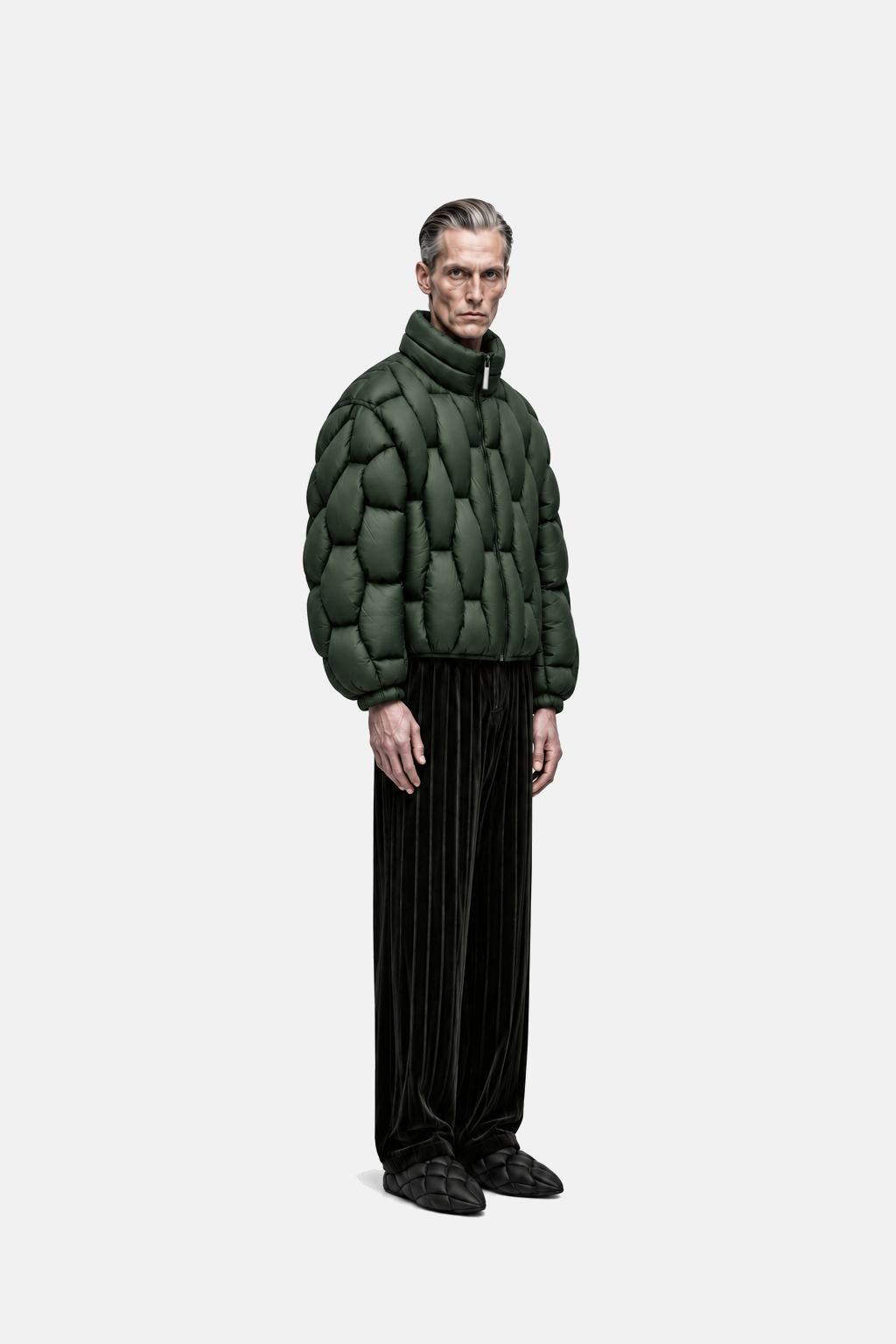 Male model wearing the forest green OCTAGON Pentagon matte puffer, three-quarter view
