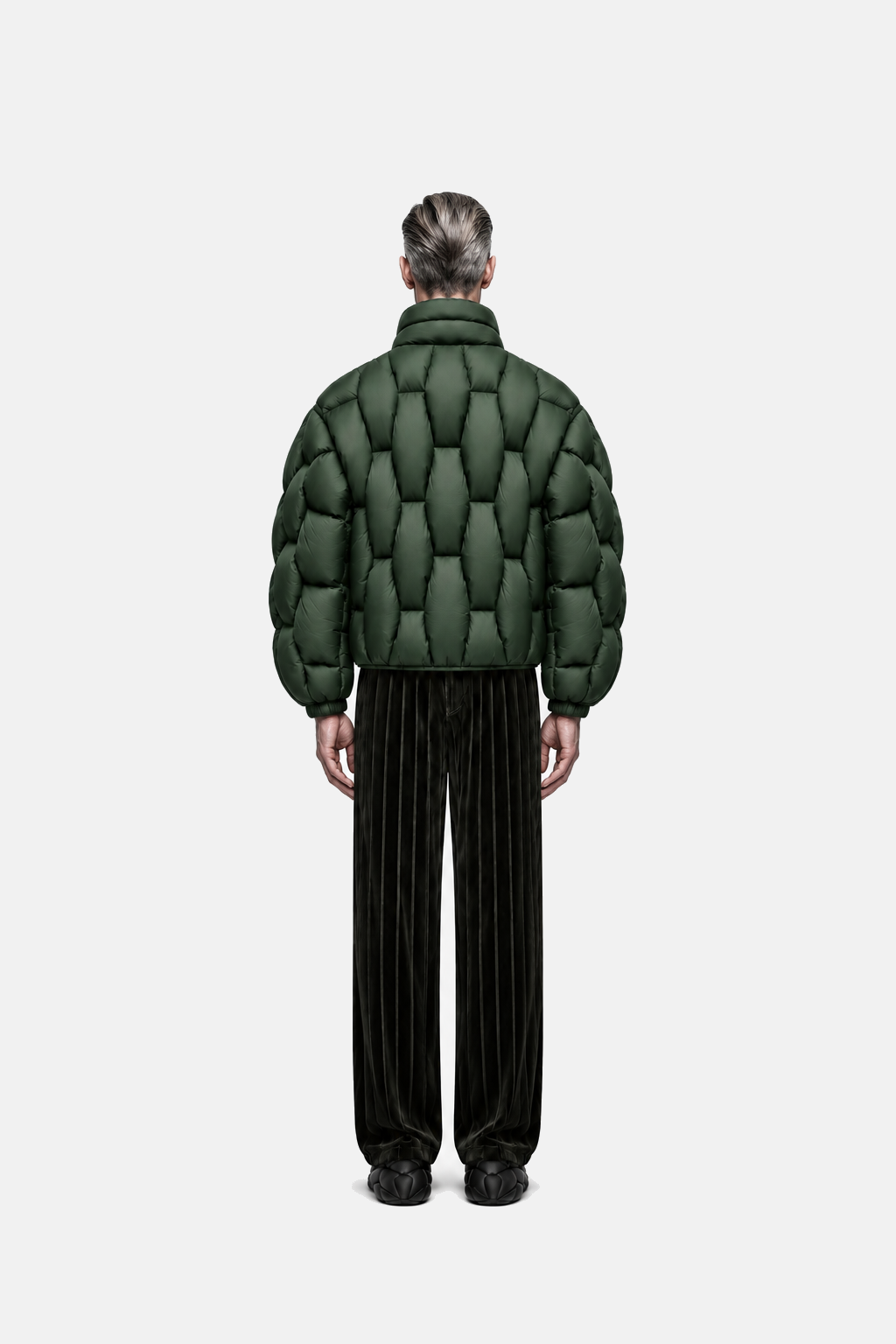 Male model wearing the forest green OCTAGON Pentagon matte puffer, rear view