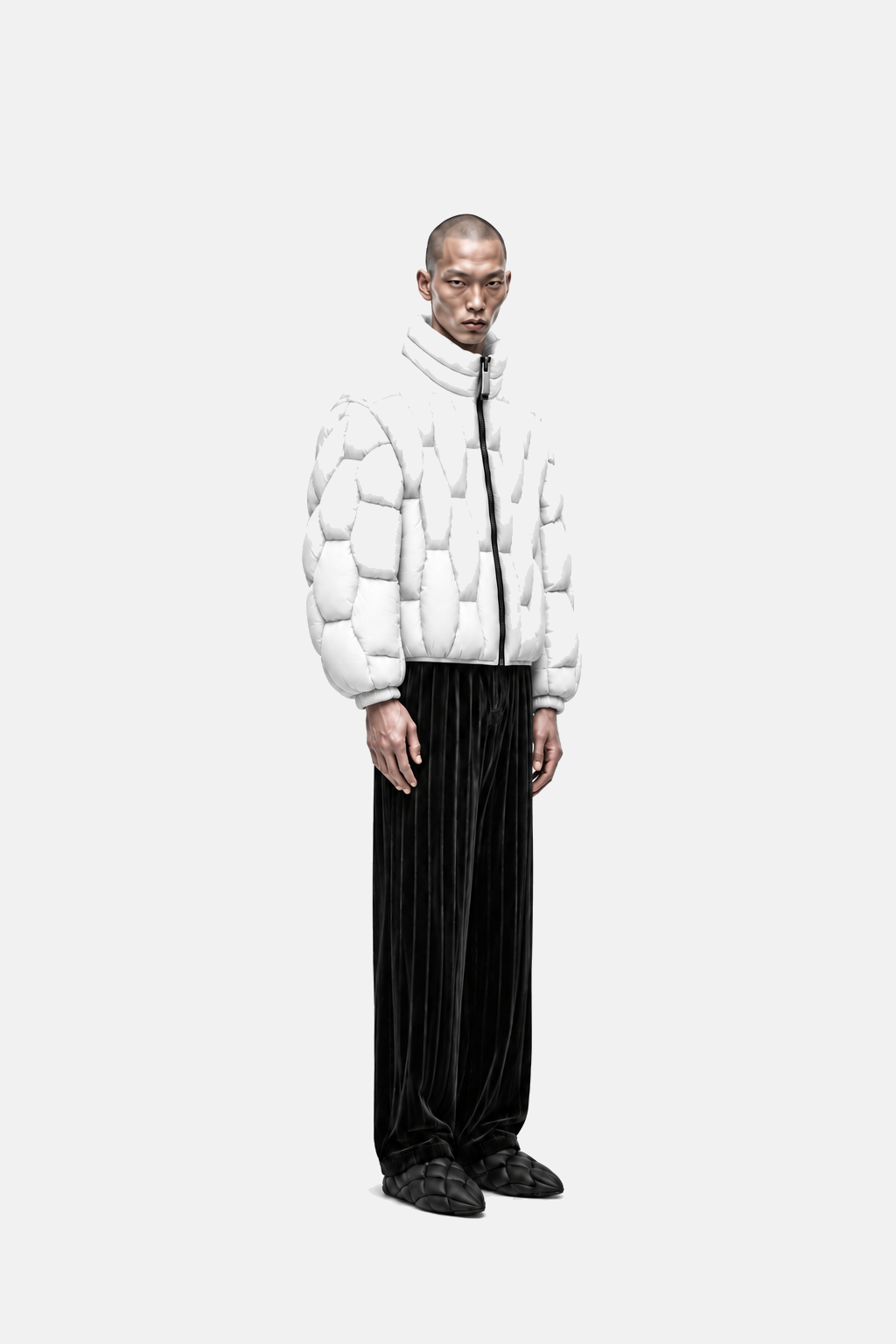 Male model wearing the white OCTAGON Pentagon matte puffer, three-quarter view